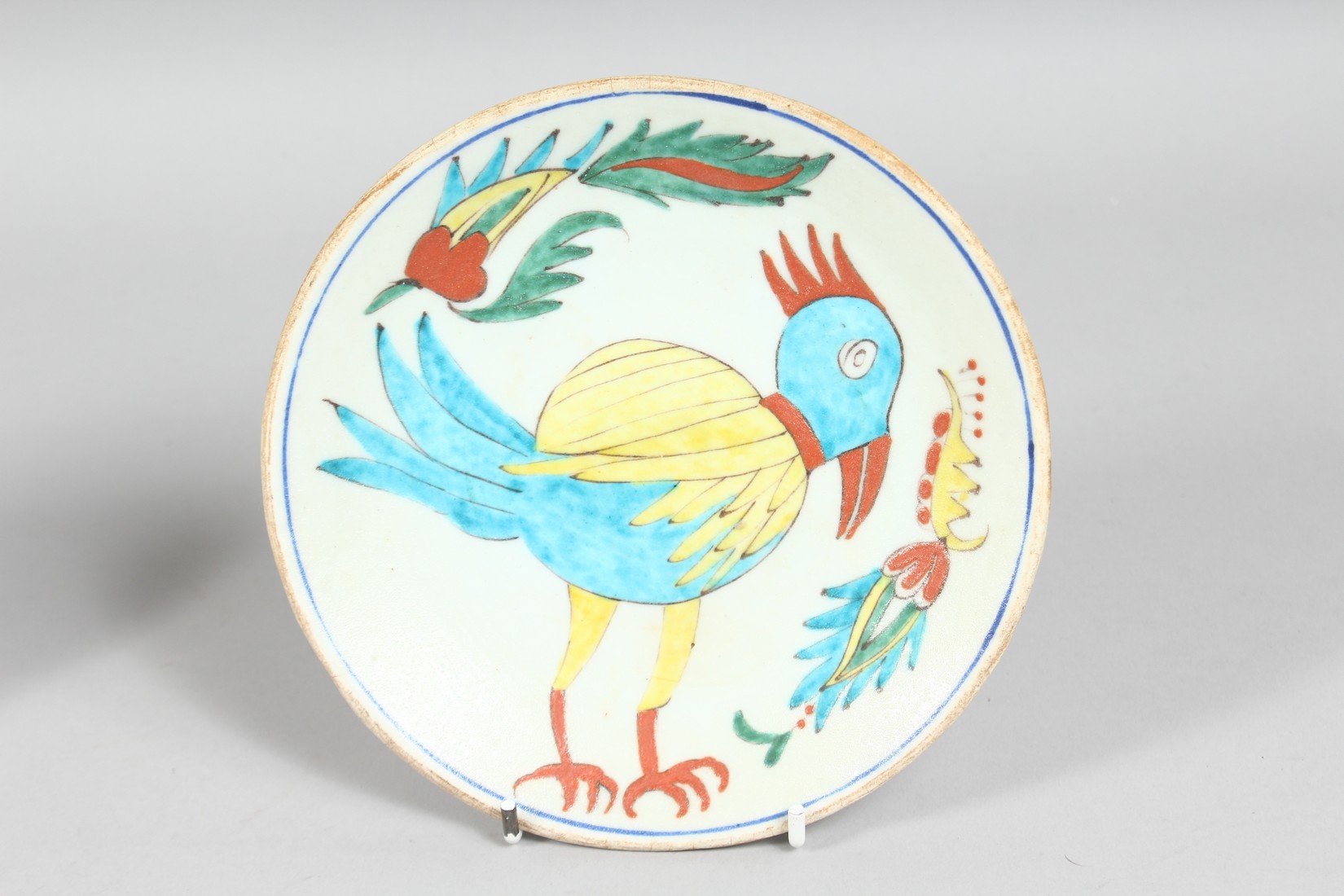 TWO TURKISH KUTAHYA GLAZED POTTERY DISHES, one painted with a figure, the other with a bird, each - Image 3 of 4