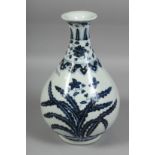 A CHINESE BLUE AND WHITE PORCELAIN YUHUCHUNPIN VASE, decorated with native flora, with six-character