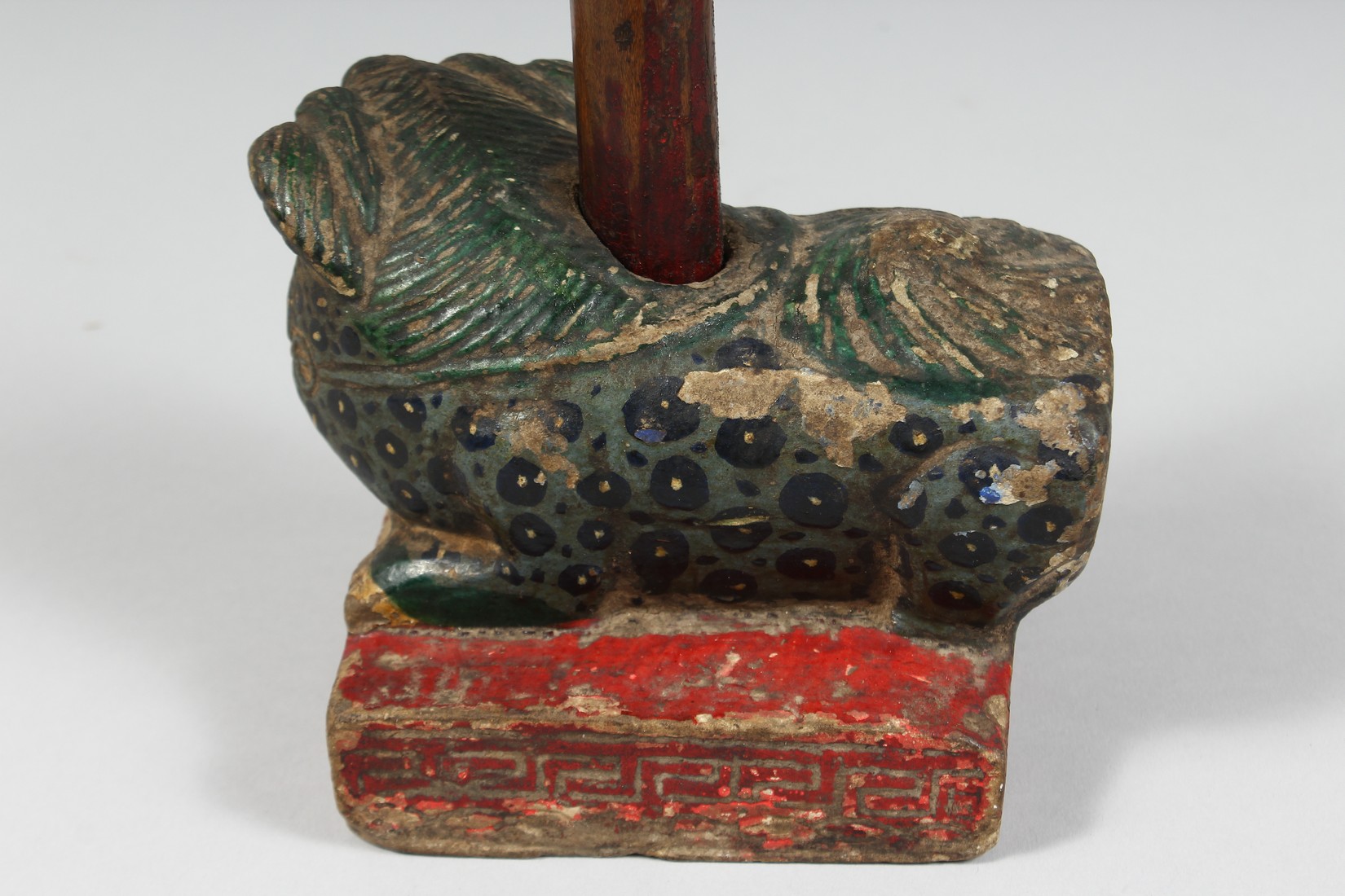 A CHINESE CARVED AND PAINTED STONE FIGURE OF A TEMPLE GUARDIAN, 15cm long. - Image 4 of 5