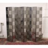 Mod-British School, Circa 1960, a steel six-fold screen, decorated with an alternating pattern of