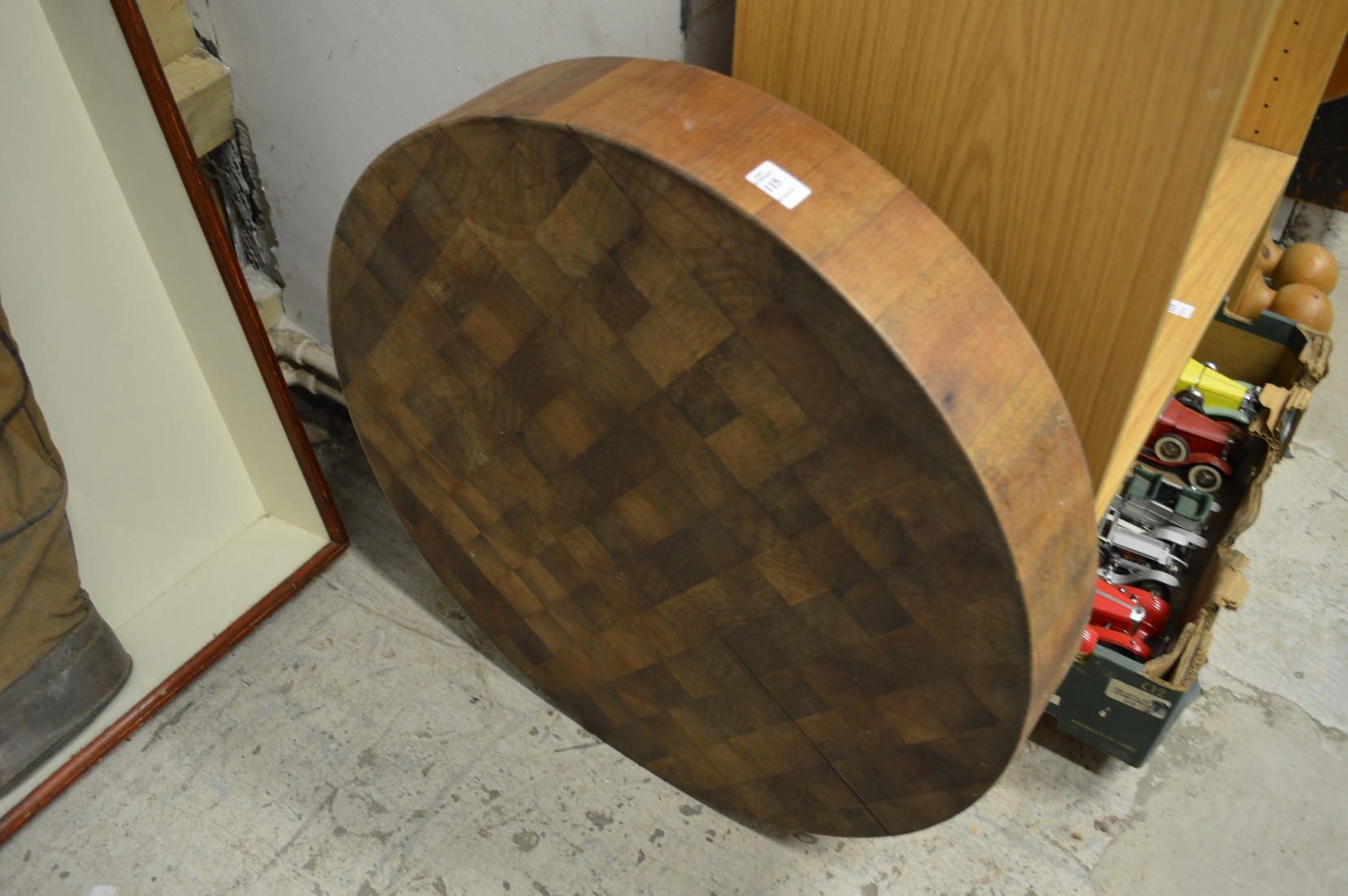 A large circular chopping board.