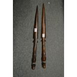 Two African carved wood spears.