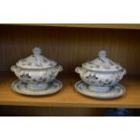 A pair of decorative porcelain tureens.