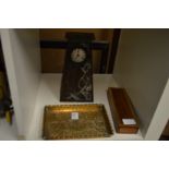 An Art Nouveau embossed brass tray, a similar mantle clock and another item.