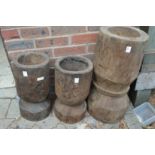 Three large turned wood mortars.