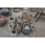 A quantity of Indian turned wood bowls and vases.