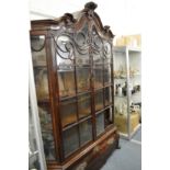 An 18th century Dutch walnut vitrine.