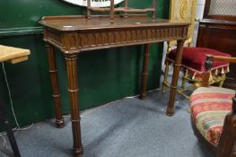 A Gothic revival oak single drawer side table.