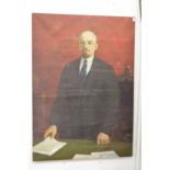 A large oil on canvas portrait depicting Lenin standing by a table, unframed.
