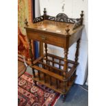 A Victorian inlaid walnut Canterbury what-not.