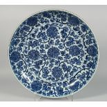 A VERY LARGE CHINESE BLUE AND WHITE PORCELAIN DISH, the interior painted with blue and white