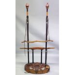 AN UNUSUAL CHINESE HARDWOOD TORTURE DEVICE, consisting of poles, leather straps and wooden yoke type