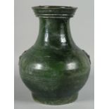 A LARGE CHINESE GREEN GLAZE TWIN HANDLE POTTERY VASE, with moulded bird motif drop ring handles,