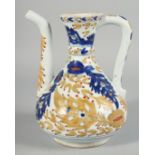 A TURKISH KUTAHYA POTTERY WATER JUG, painted with foliate decoration, 21.5cm high.