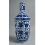 A CHINESE BLUE AND WHITE PORCELAIN VASE, pained with panels of floral motifs, the base with six-