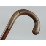 AN ANTIQUE RHINO HORN WALKING STICK, 85cm long.**Please note: this item can only be sold within th