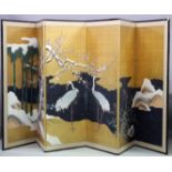 A JAPANESE LATE MEIJI SIX PANEL FOLDING SCREEN, with gold paper background and painted continuous
