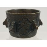 A RARE SMALL 18TH CENTURY PERSIAN ENGRAVED BRONZE MEDICINAL MORTAR, 6cm diameter.