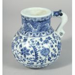 A CHINESE BLUE AND WHITE PORCELAIN JUG, decorated with lotus and other flora with scrolling vine,