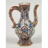 A SMALL CHINESE BLUE AND WHITE PORCELAIN CLOBBERED EWER, 14cm high, (af).