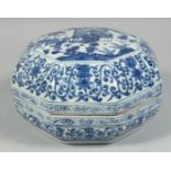 A LARGE CHINESE BLUE AND WHITE PORCELAIN OCTAGONAL BOX AND COVER, the cover painted with a scene