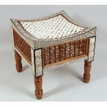 A 20TH CENTURY EGYPTIAN MOTHER OF PEARL INLAID SQUARE FORM WOODEN STOOL, the sides with mashrabiya
