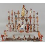 A LARGE COLLECTION OF INDIAN SCHOOL CARVED WOODEN FIGURES, of various subjects, shapes and sizes, (