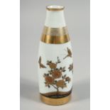A SMALL JAPANESE PORCELAIN VASE, with gilt work decoration depicting flowers and butterflies, signed