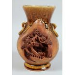 A CHINESE PART-GLAZED POTTERY VASE with relief moulded decorative panel to body and moulded drop