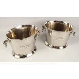 A PAIR OF OVAL TWO HANDLED CHAMPAGNE WINE COOLERS. 12ins diameter.