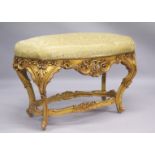 A GOOD LARGE FRENCH GILTWOOD OVAL STOOL with padded top. 41ins long.