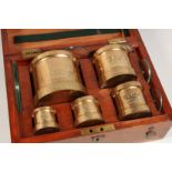 THE COUNTY BOROUGH OF HUDDERSFIELD. A SET OF SIX BRASS MEASURES, pint to a 1/4 gill, in a