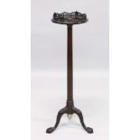 A GOOD GEORGIAN STYLE MAHOGANY TRIPOD STAND the top with pierced fret carving, on tripod support,