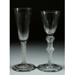 TWO GEORGIAN WINE GLASSES, one with white opaque stem, 6.75ins high, the other with double knop stem
