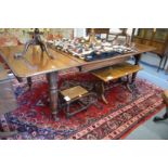A GOOD 19TH CENTURY MAHOGANY EXTENDING DINING TABLE with two leaves on turned and carved supports.