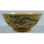 A LARGE CHINESE FAMILLE JAUNE CIRCULAR BOWL (A/F). 7ins diameter.