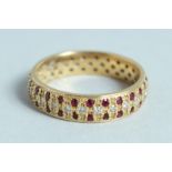 AN 18CT GOLD, RUBY AND DIAMOND RING.