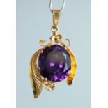 A GOOD AMETHYST PENDANT in an 18ct gold mount.