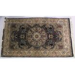 A GOOD KASHAN FLORAL RUG with large circular medallion on a blue ground 7ft 10 ins long x 4ft 5ins