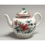 A CHRISTIANS LIVERPOOL TEA POT AND COVER painted in famille rose style with trailing flowers under a