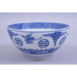 A CHINESE BLUE AND WHITE PORCELAIN BOWL, the exterior decorated with cranes and stylised clouds,