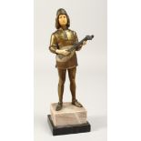 A 19TH CENTURY BRONZE STANDING MAN, playing a mandolin with bone face and hands. 10.5ins high.