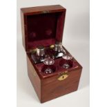 A 19TH CENTURY MAHOGANY CASED PAIR OF DECANTERS AND PAIR OF GLASSES. The square case inset with