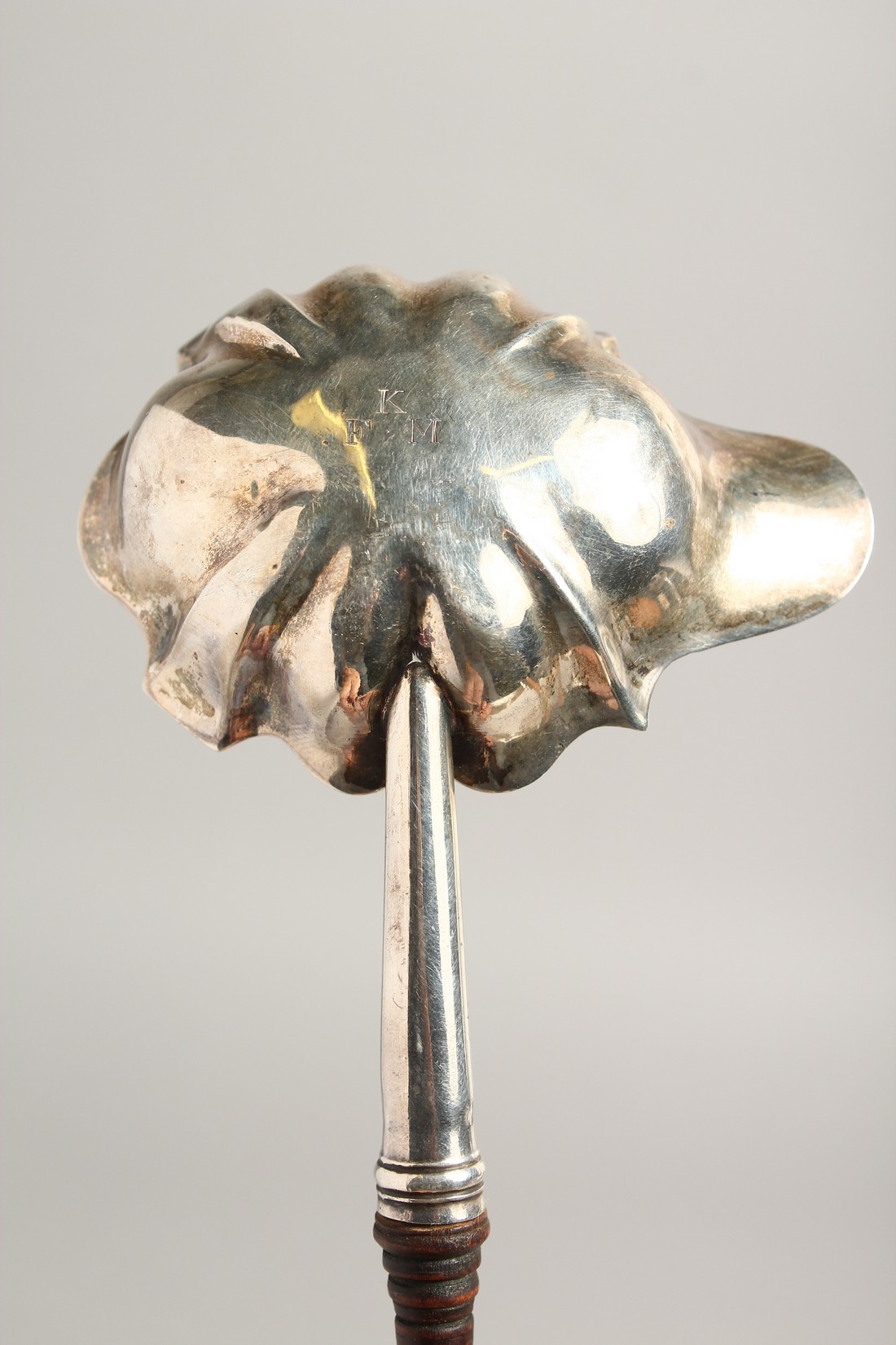 A GEORGE III SILVER PUNCH LADLE with turned wood handle. London 1772. Maker, W. B. - Image 4 of 6