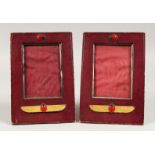 AN INTERESTING PAIR OF LEATHER PHOTOGRAPH FRAMES. 8.ins x 5.5ins