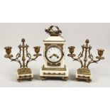 A 19TH CENTURY FRENCH WHITE MARBLE AND ORMOLU THREE PIECE CLOCK GARNITURE, the clock striking on a