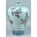 A LARGE CHINESE DOUCAI MEIPING decorated with panels of flowers. 15ins high.