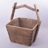 A CHINESE SQUARE FORM WOODEN GRAIN BUCKET 54cm high.