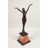 AFTER D. CHIPARUS. A BRONZE DANCER on a marble base. Signed. 22ins overall.