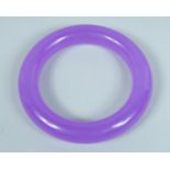 A LAVENDER JADE BANGLE.